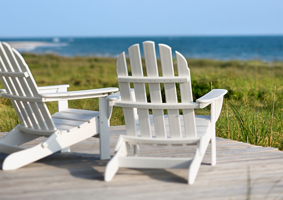 Adirondack chair on a coastal decorated porch